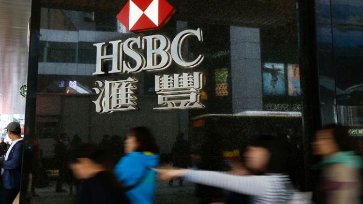 HSBC third quarter profit rises 28 percent on lower costs, beats forecasts