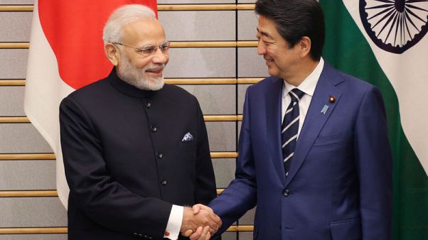 India's Modi and Japan's Abe draw closer as Tokyo woos Beijing India's Modi and Japan's Abe draw closer as Tokyo woos Beijing