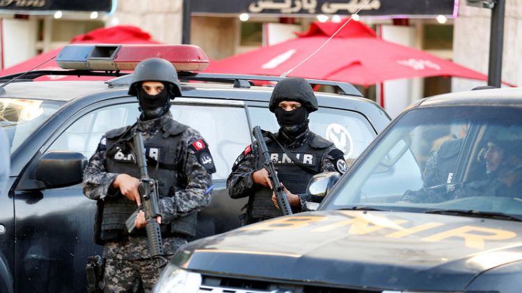Woman blows herself up in Tunis, wounding 15 people including 10 police officers