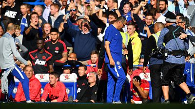 Chelsea coach fined by FA over Mourinho touchline row