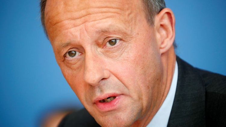 Merz promises to take Merkel's party right in Germany