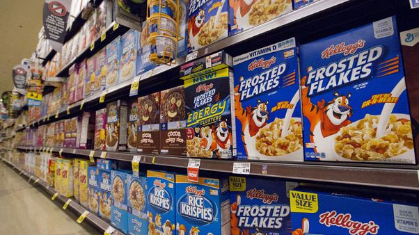 Kellogg cuts full-year profit outlook, shares tumble Kellogg cuts full-year profit outlook, shares tumble