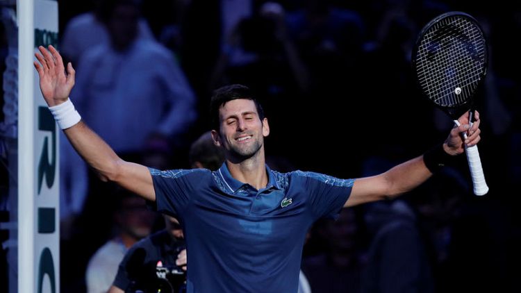 Djokovic back on top after Nadal withdraws in Paris