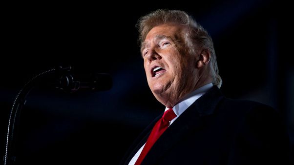 Trump's final campaign stretch rattled by twin calamities Trump's final campaign stretch rattled by twin calamities
