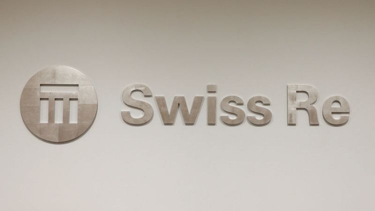Swiss Re swings to profit in first nine months despite large claims