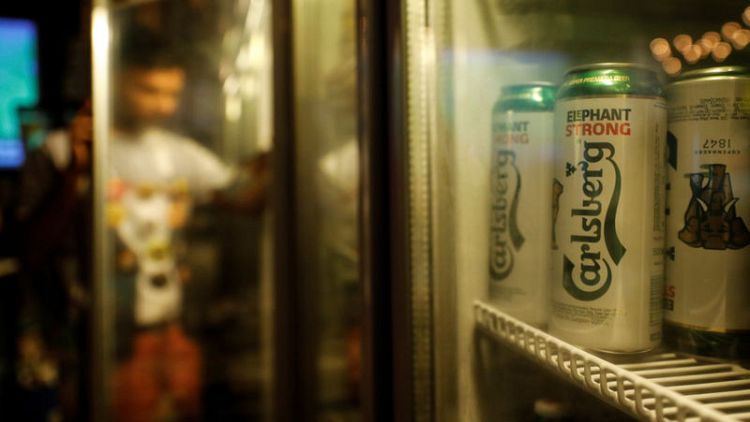 Carlsberg third-quarter sales beat forecast, confirms lifted 2018 outlook