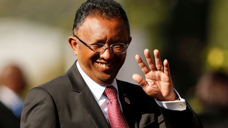 Wealthy Madagascar candidates woo sceptical voters trapped by poverty