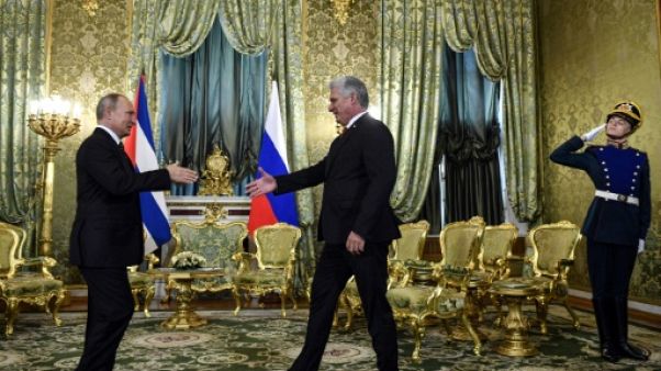 Poutine reçoit le président cubain pour sa première visite en Russie Poutine reçoit le président cubain pour sa première visite en Russie