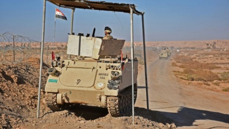 Après un revers des anti-EI en Syrie, l'Irak redéploie des forces à la frontière