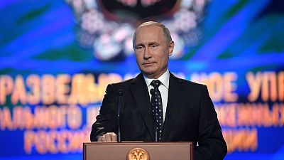 Putin praises skills of GRU spy agency accused of UK poison attack Putin praises skills of GRU spy agency accused of UK poison attack