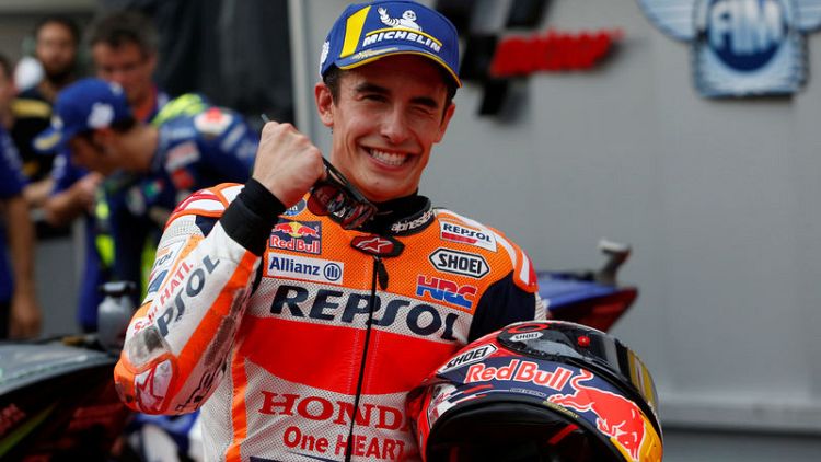 Dominant Marquez on pole after Malaysia storm