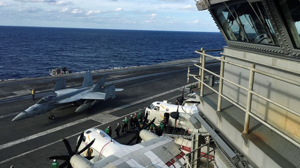 U.S. carrier leads warships in biggest ever Japan defence war game U.S. carrier leads warships in biggest ever Japan defence war game