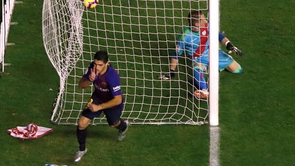 Suarez strikes late as Barca snatch victory at Rayo Suarez strikes late as Barca snatch victory at Rayo