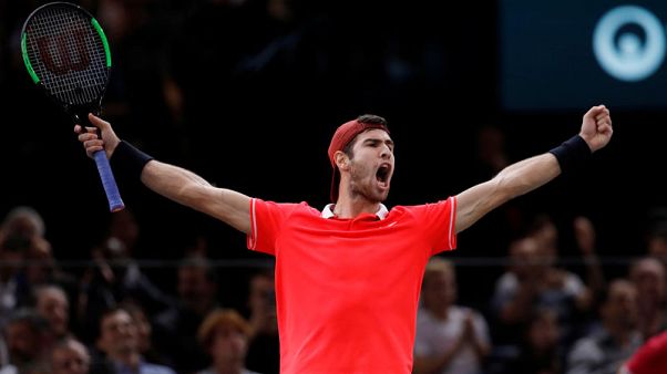 Khachanov shocks Djokovic to win Paris crown Khachanov shocks Djokovic to win Paris crown