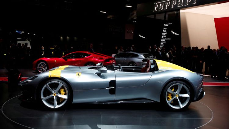Ferrari's earnings rise, lack of full-year upgrade hits shares