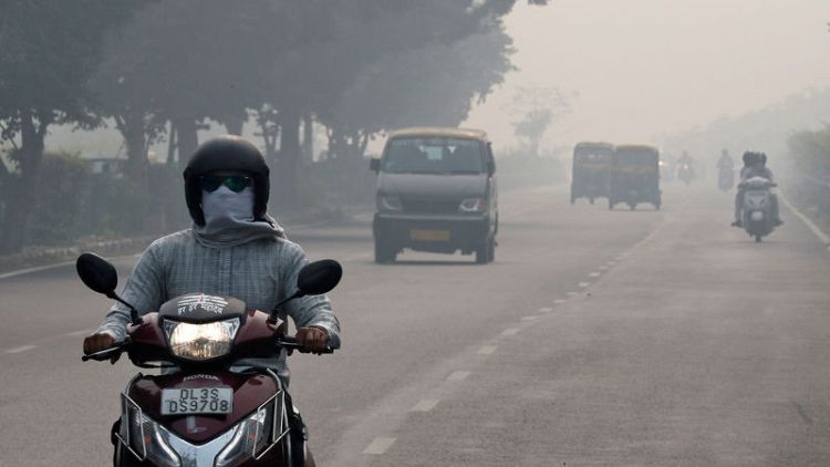 Indian capital under cloud of smog as pollution level jumps