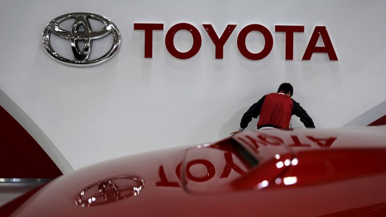 Toyota lifts full-year profit forecast on weaker yen