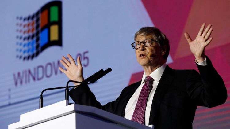Bill Gates, on China trip, lauds free trade - and futuristic toilets
