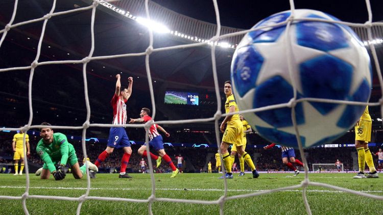 Atletico snap Dortmund's unbeaten run with 2-0 win