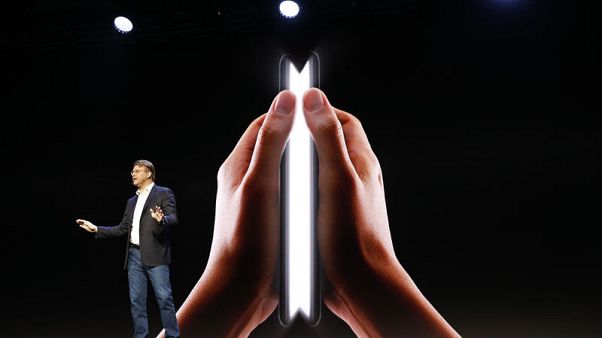 Samsung gives first glimpse of foldable phone Samsung gives first glimpse of foldable phone
