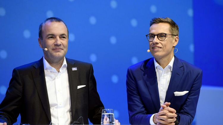 Reserved Bavarian, sporty Finn seek centre-right ticket for EU's top job