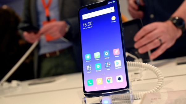 Smartphone maker Xiaomi launches in Britain with flagship device Smartphone maker Xiaomi launches in Britain with flagship device