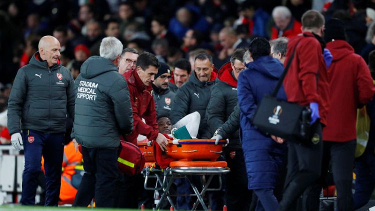 Arsenal's Welbeck given oxygen after serious ankle injury