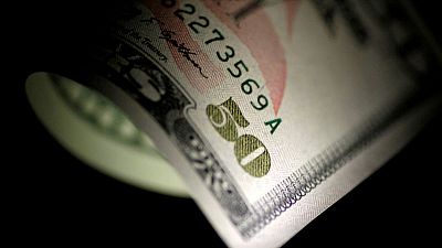 الدولار يرتفع صوب أعلى مستوى في 16 شهرا بعد تلميحات المركزي الأمريكي الدولار يرتفع صوب أعلى مستوى في 16 شهرا بعد تلميحات المركزي الأمريكي