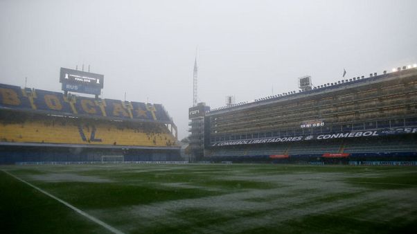 First leg of final of Copa Libertadores in Buenos Aires postponed due to rain First leg of final of Copa Libertadores in Buenos Aires postponed due to rain
