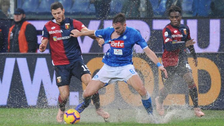 Napoli splash their way to a 2-1 win at Genoa