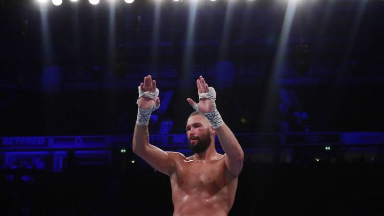 Cruiserweight king Usyk sends Bellew crashing into retirement