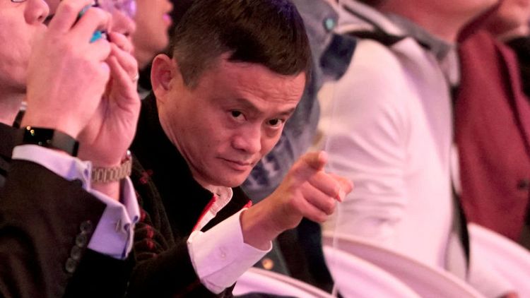 Alibaba Singles' Day tops $30 billion but growth rate plunges