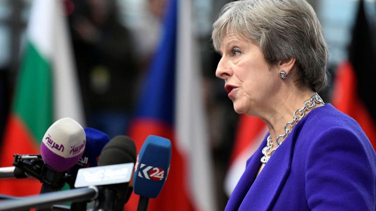 May says Britain open to 'different relationship' with Russia