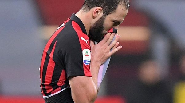 Soccer - Higuain apologises for sending off in Juve defeat Soccer - Higuain apologises for sending off in Juve defeat