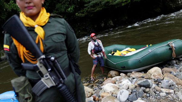 From gunbattles to tourism: Colombia's ex-rebels turn rafting guides From gunbattles to tourism: Colombia's ex-rebels turn rafting guides
