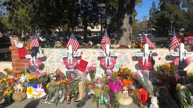 Carpenter erects wooden crosses in honour of shooting rampage victims