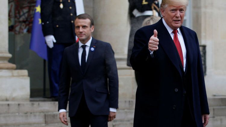 Trump, after visit, slams France's Macron over 'low approval rating'