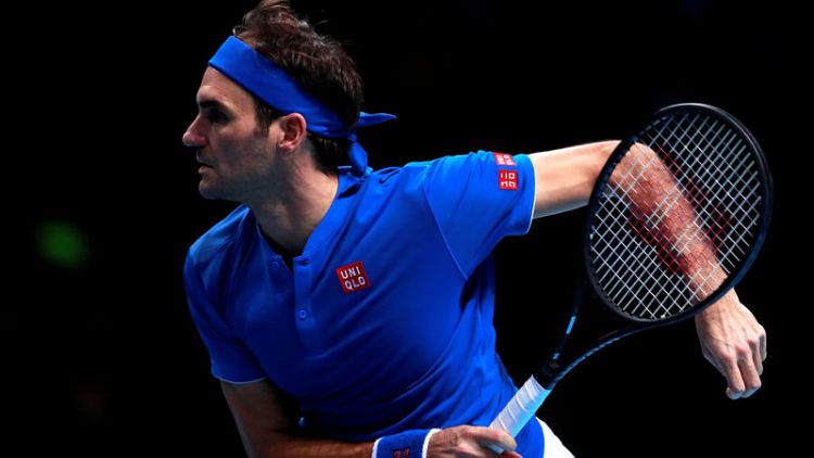 Federer outclasses Thiem to keep ATP Finals hopes alive