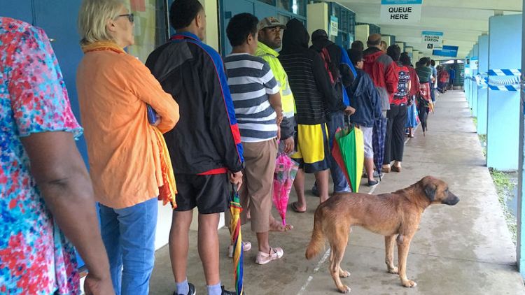 Heavy rain delays some voting as drenched Fijians go to the polls