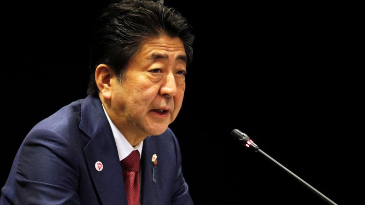 Japan's Abe says wants to discuss peace treaty with Putin today