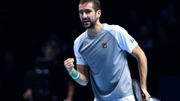 Masters: Cilic bat Isner en trois sets, Djokovic en demi-finales Masters: Cilic bat Isner en trois sets, Djokovic en demi-finales