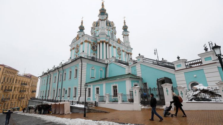 Petrol bombs lobbed at Kiev church as Russia row festers