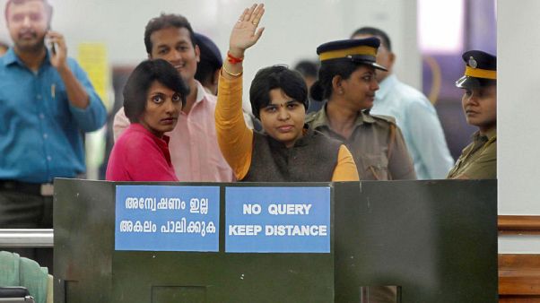 Indian airport protesters block woman activist's plan to enter hill temple Indian airport protesters block woman activist's plan to enter hill temple