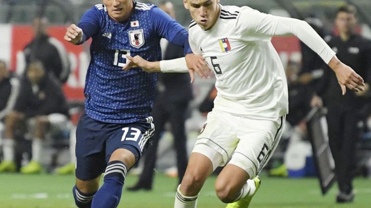 Late Venezuelan penalty clinches draw against Japan