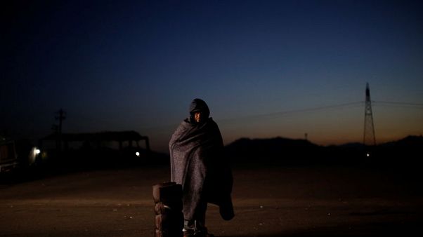 Central Americans stalled at U.S.-Mexico border, mull work offers Central Americans stalled at U.S.-Mexico border, mull work offers
