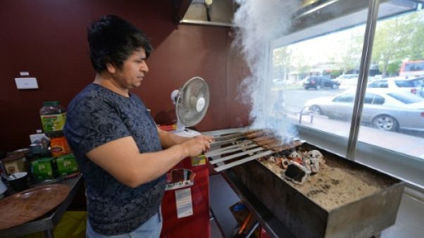 De l'Afghanistan au bush: les réfugiés qui renoncent aux villes australiennes surpeuplées De l'Afghanistan au bush: les réfugiés qui renoncent aux villes australiennes surpeuplées