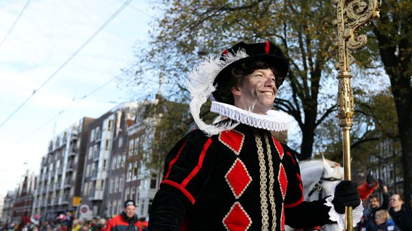 Festive fun or racism? Dutch 'Black Pete' row gets violent Festive fun or racism? Dutch 'Black Pete' row gets violent