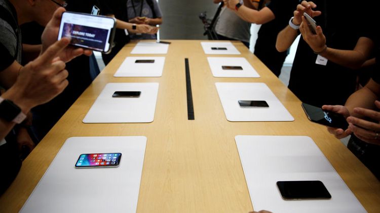 Apple cuts production orders for all three new iPhone models - WSJ