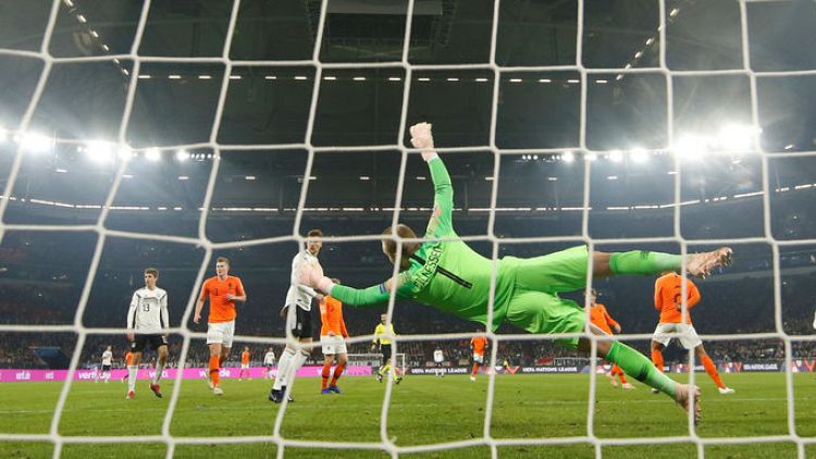 Soccer-Late goals earn Dutch spot in Nations League finals