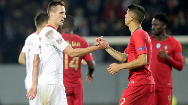 Milik's twice-taken penalty gives relegated Poland draw in Portugal